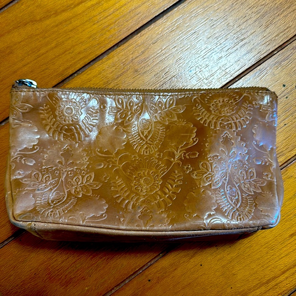 The Sak embossed leather makeup bag